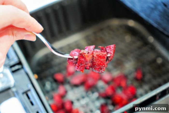 Sweet and Tender Air Fryer Beets 2 Fresh beets in air fryer basket, ready for cooking