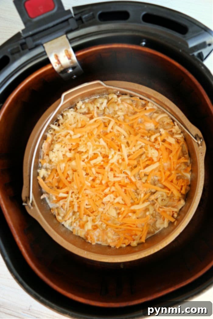 A dish of air fryer macaroni and cheese being served as a dinner item.
