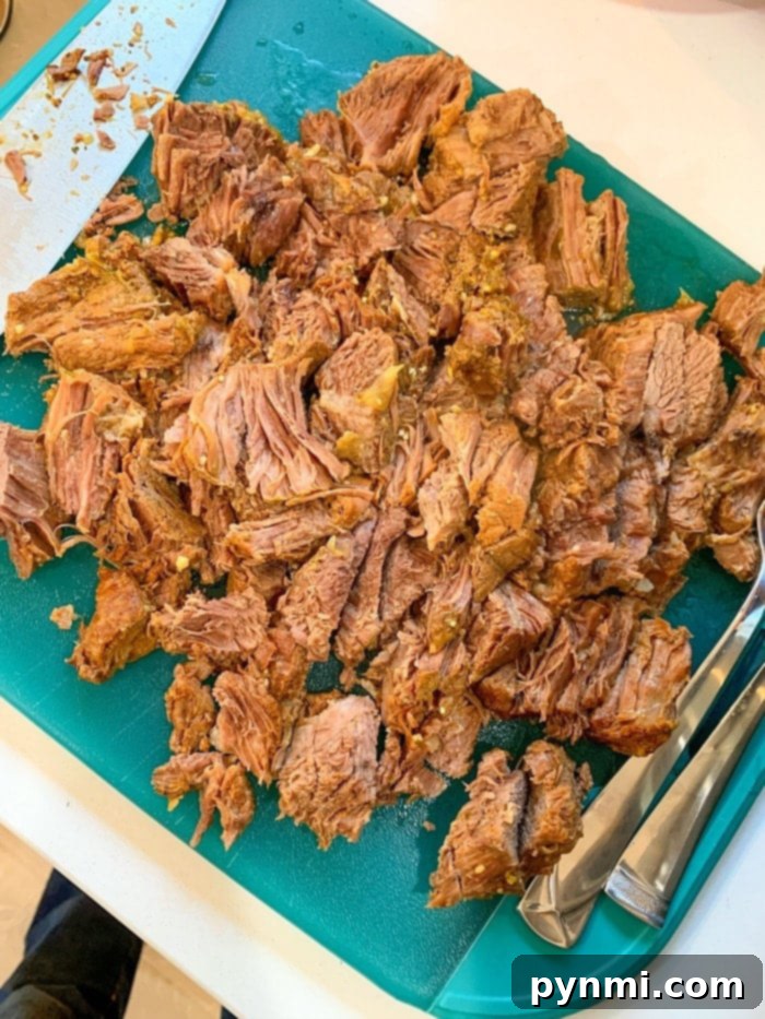 No Thaw Slow Cooker Pot Roast 11 A beautifully presented slow-cooked chuck roast, fork-tender and ready to be enjoyed as a hearty family meal.