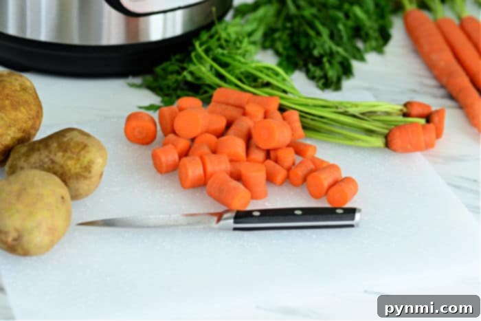 Easy Instant Pot Potatoes and Carrots 4 Neatly sliced carrots, uniform and ready for cooking