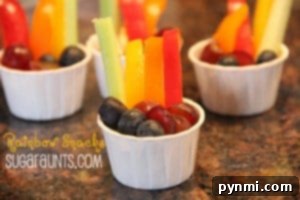 Individual Rainbow Snack Cups for kids, a healthy St. Patrick's Day treat