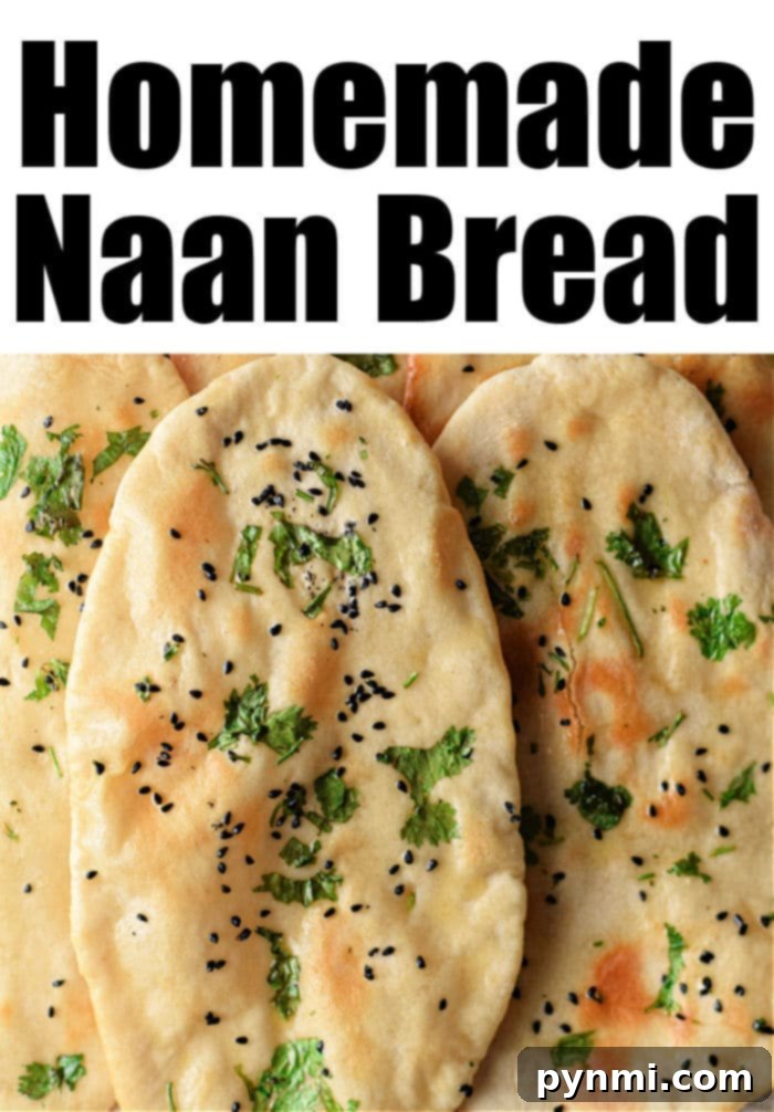 Pillowy Soft Air Fryer Naan 7 A stack of golden brown homemade naan bread on a white plate, garnished with fresh cilantro.