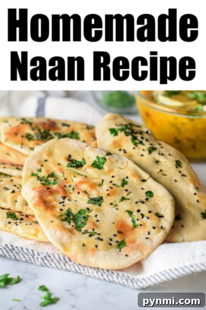 Pillowy Soft Air Fryer Naan 9 A plate of easy naan bread recipe, with various dipping sauces in the background.