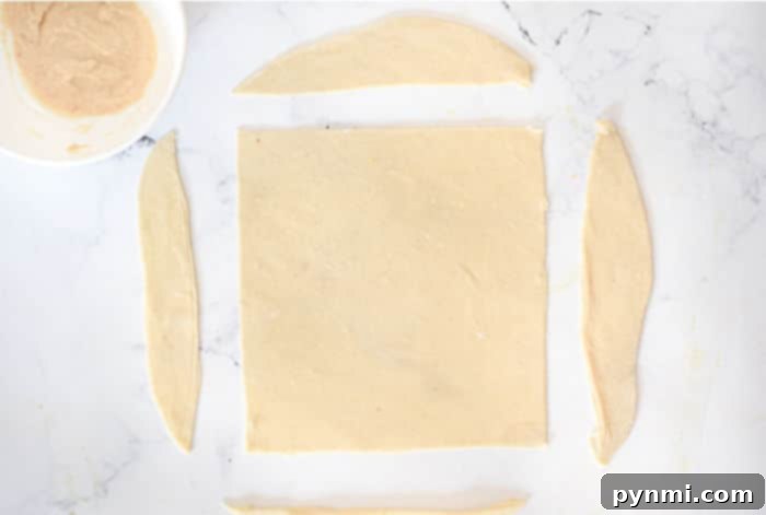 Crispy Homemade Egg Roll Wrappers from Scratch 5 Egg roll wrappers cut into perfect squares