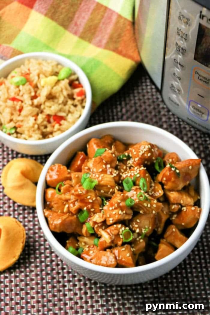 Flavorful Asian Chicken 10 A beautifully plated Instant Pot General Tso's Chicken, garnished and ready to be enjoyed.