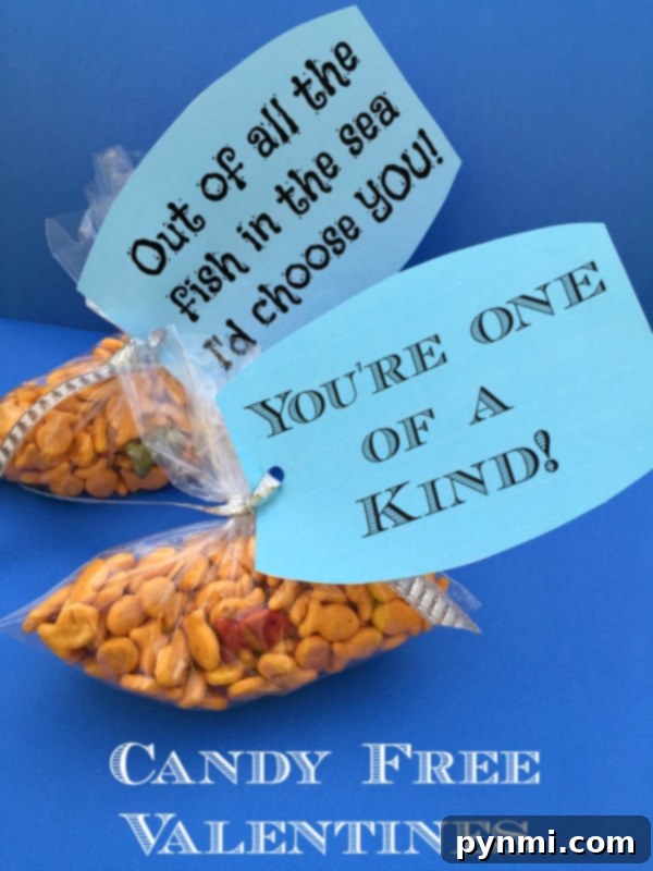 Valentine's Day Fun: Free Printable Tags & Treats 4 A creative Valentine's Day treat for kids featuring Goldfish crackers paired with a cute printable tag, emphasizing a healthy, easy, and affordable candy-free option for school.
