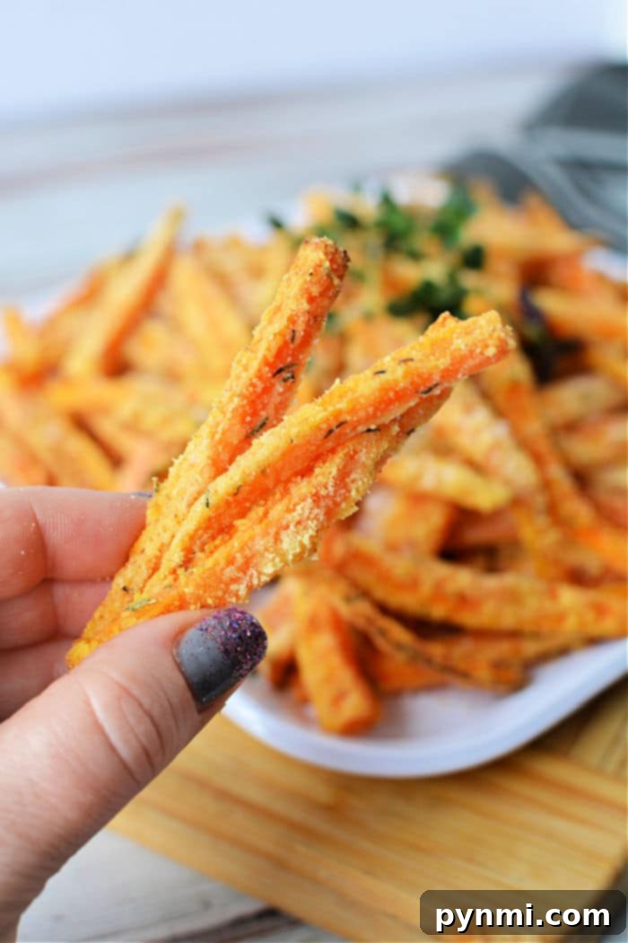 Crispy Air Fryer Carrot Fries 2 Crispy air fryer carrot fries stacked on a plate