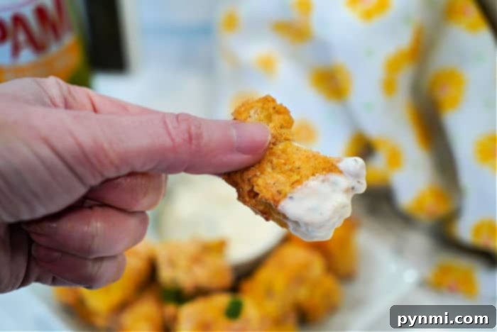 Golden Air Fryer Fish Bites 11 Homemade air fryer fish sticks, golden and ready to serve.
