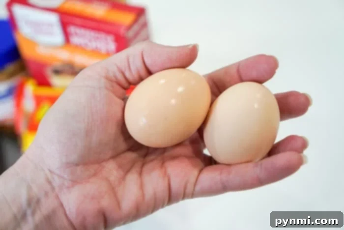 Beyond the Shell: A Guide to Eggs 8 mixed brown and white eggs in a basket