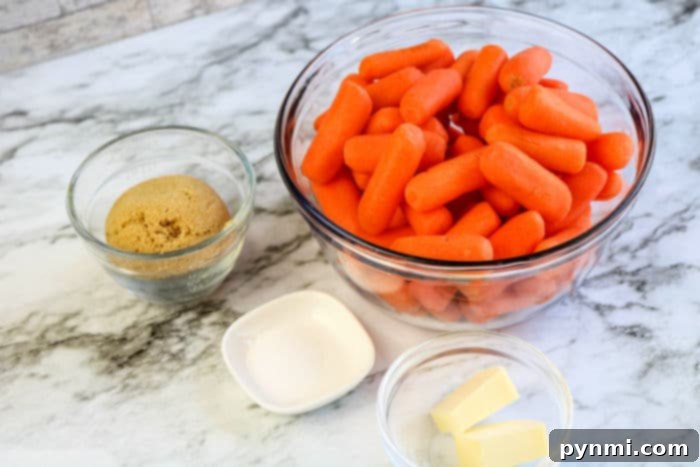 Effortless Crockpot Carrots 3 Close-up of tender Slow Cooker Carrots in a serving dish, showcasing their rich glaze.