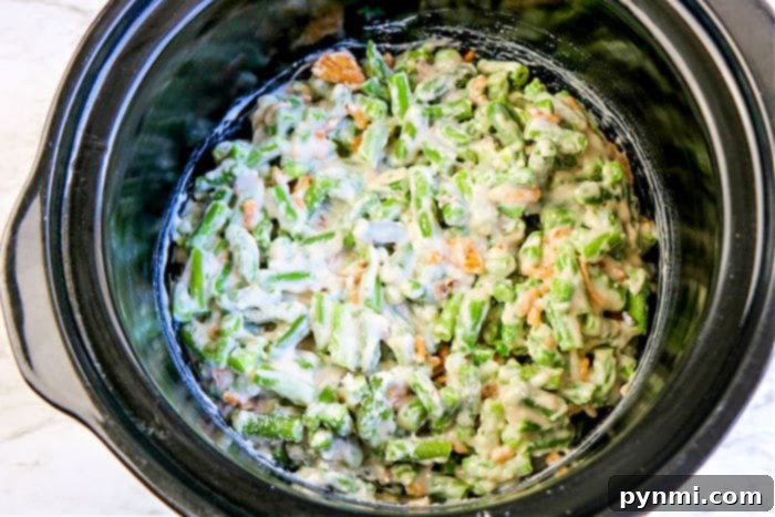 Green Bean Casserole cooking in a Crock-Pot.