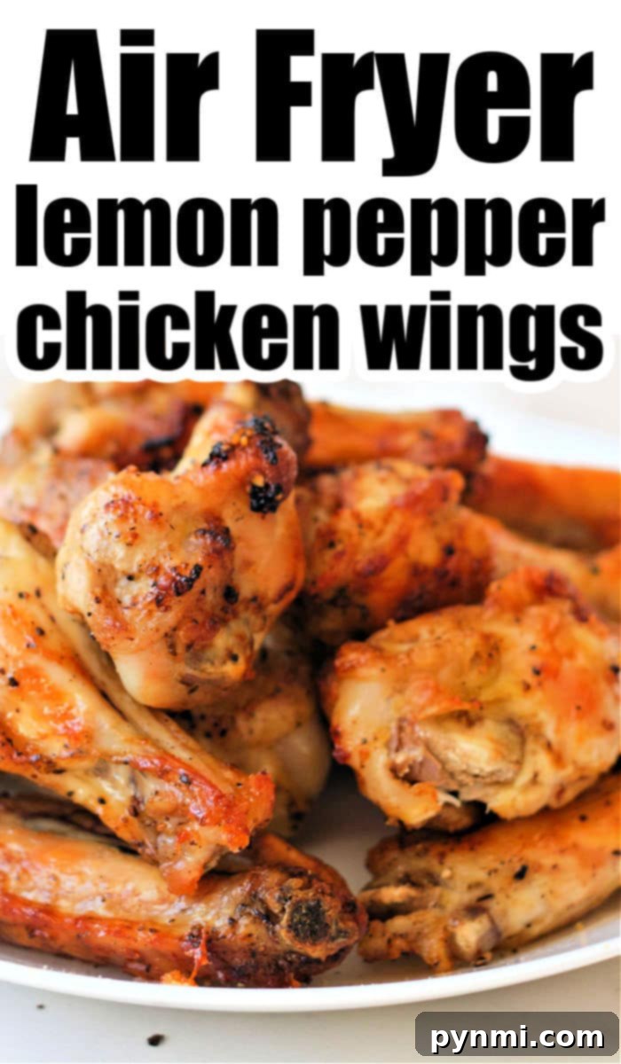 A plate of golden brown wings, seasoned to perfection, with the text "Lemon Pepper Chicken Wings Air Fryer" overlayed.