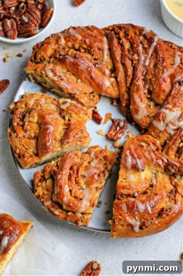 Beautiful Braided Bread 2 Beautifully baked cinnamon pull apart braided sweet bread wreath, golden brown and ready to serve on a festive table.