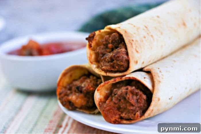 Crispy Air-Fried Flautas 10 Crispy beef and bean taquitos, freshly cooked and ready to be served, highlighting their golden-brown perfection.