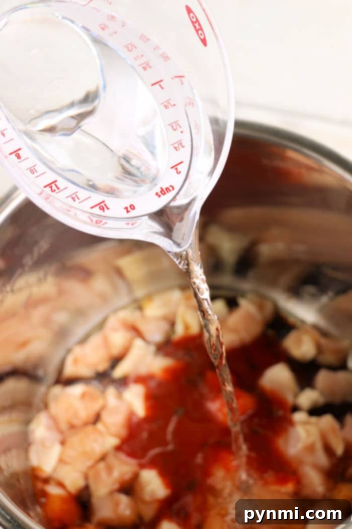 Speedy Instant Pot Pad Thai 4 Pressure cooker full of ingredients for Pad Thai