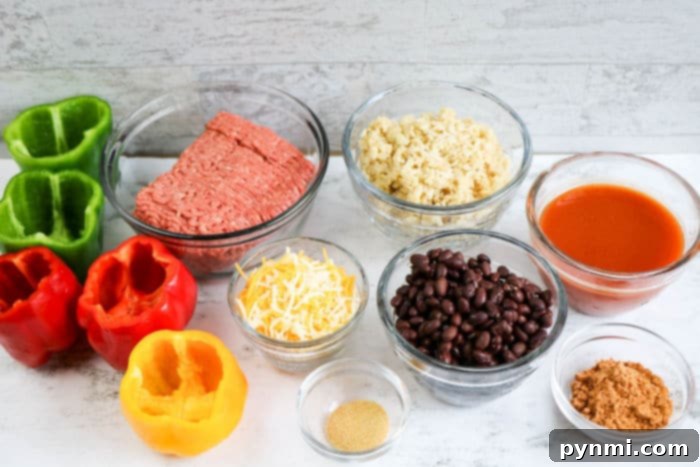 Effortless Slow Cooker Stuffed Bell Peppers 3 Ingredients for Stuffed Bell Peppers including ground beef, rice, cheese, and seasoning.