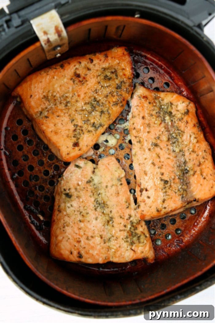 Air fryer frozen salmon, golden brown and ready to be served.