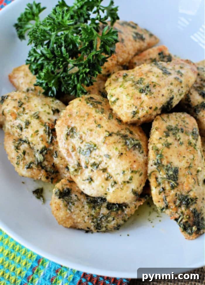 Crispy Air-Fried Boneless Chicken Bites 2 A vibrant plate of golden-brown air fryer boneless wings, perfectly cooked and ready to be enjoyed.