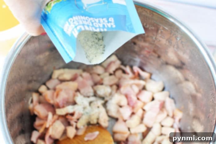 Ultimate Cheesy Bacon Ranch Chicken Soup 4 Ingredients for ranch chicken soup, including ranch seasoning packet.