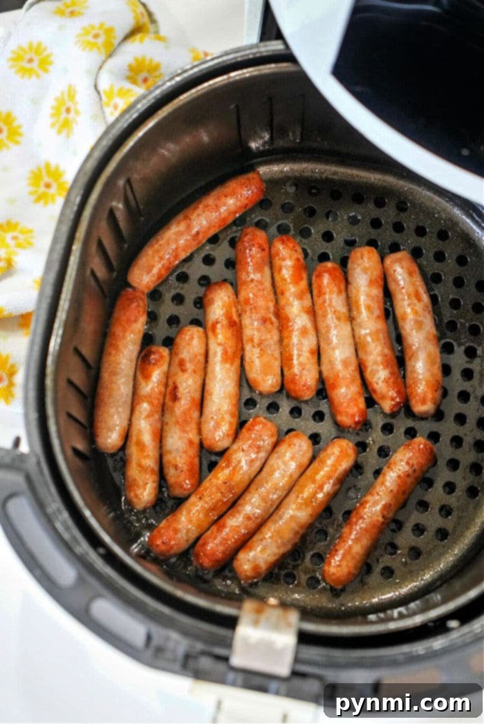 Air Fryer Sausage Perfection 2 Crispy Air Fryer Sausage Links ready to serve for breakfast