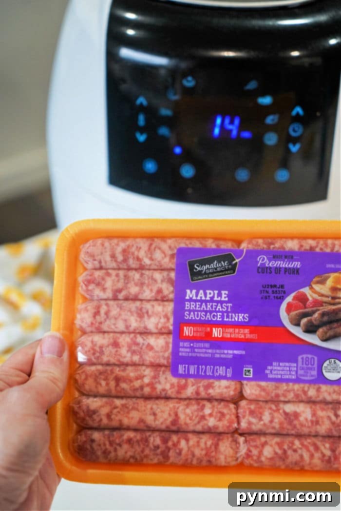 Air Fryer Sausage Perfection 5 A close-up of golden brown air fryer sausage links in an air fryer basket.