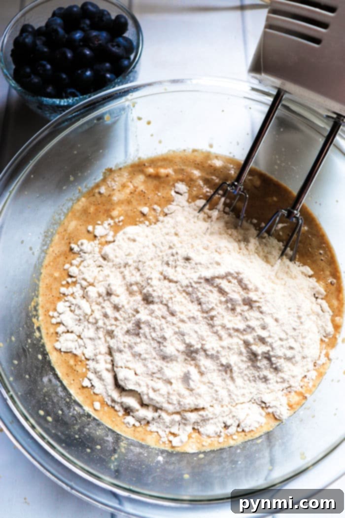 A batch of homemade bran muffins cooling on a wire rack.
