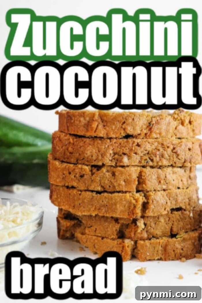 Tropical Coconut Zucchini Loaf 7 Two loaves of Coconut Zucchini Bread, one whole and one sliced, on a wooden board