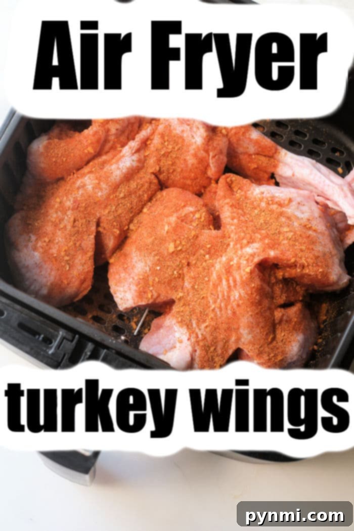 Crispy Air Fryer Turkey Wings 5 Air fried turkey wings in the basket