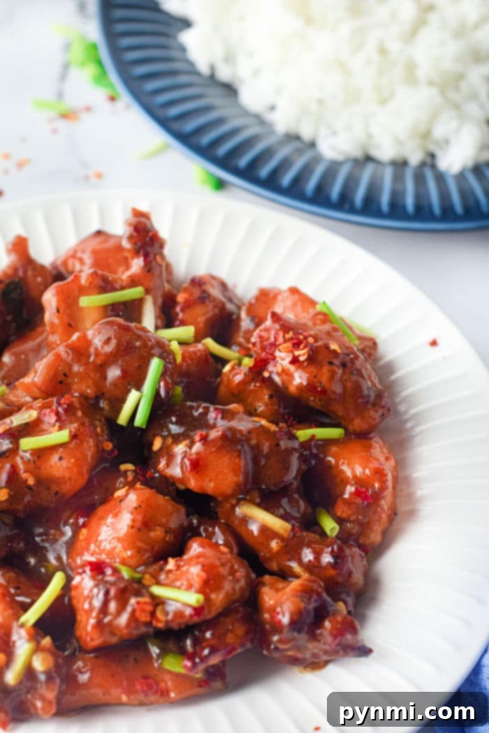 Crispy Air-Fried Sesame Chicken 8 Plated Air Fryer Sesame Chicken with garnish
