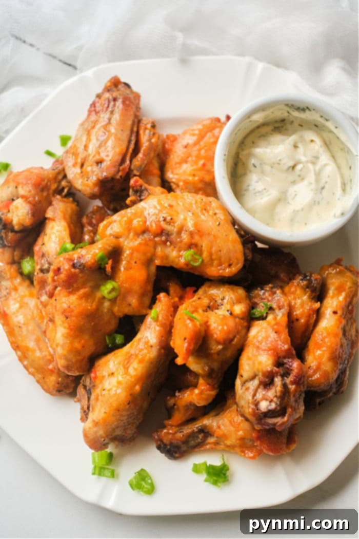 Crispy Air Fryer Hot Wings served with dipping sauce
