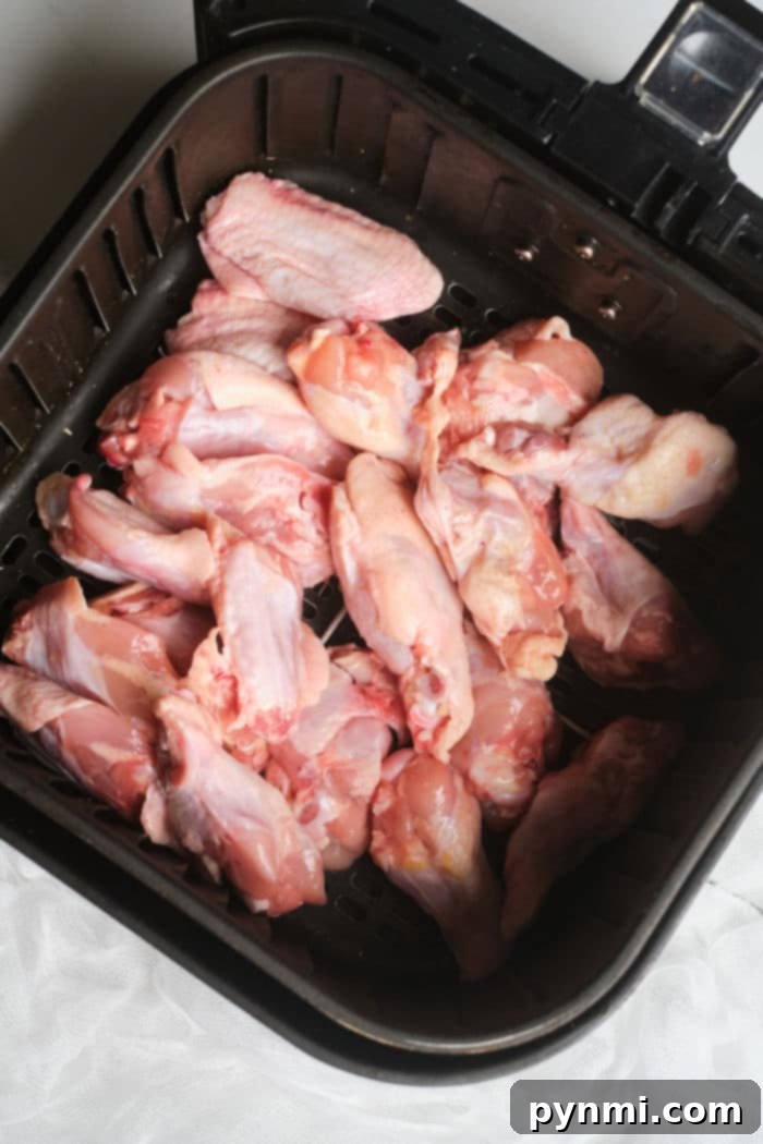 Uncooked chicken wings ready for the air fryer
