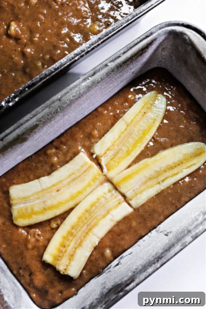 banana bread gingerbread loaf, topped with banana slices