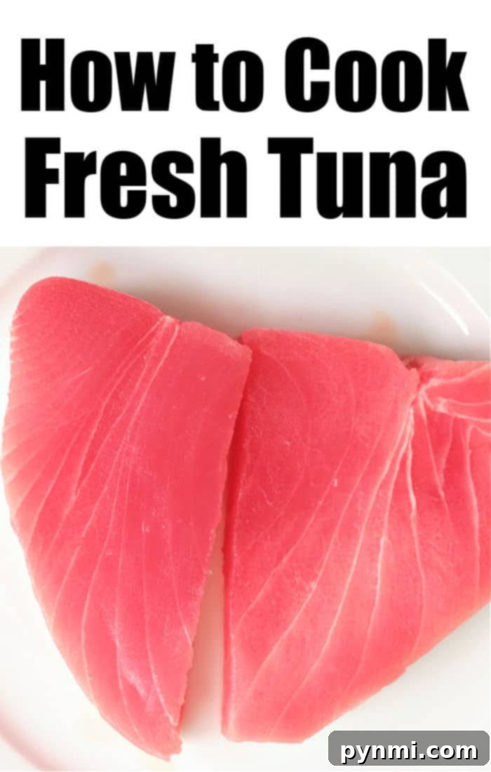 A close-up of a raw tuna steak, showcasing its fresh, vibrant color before cooking.