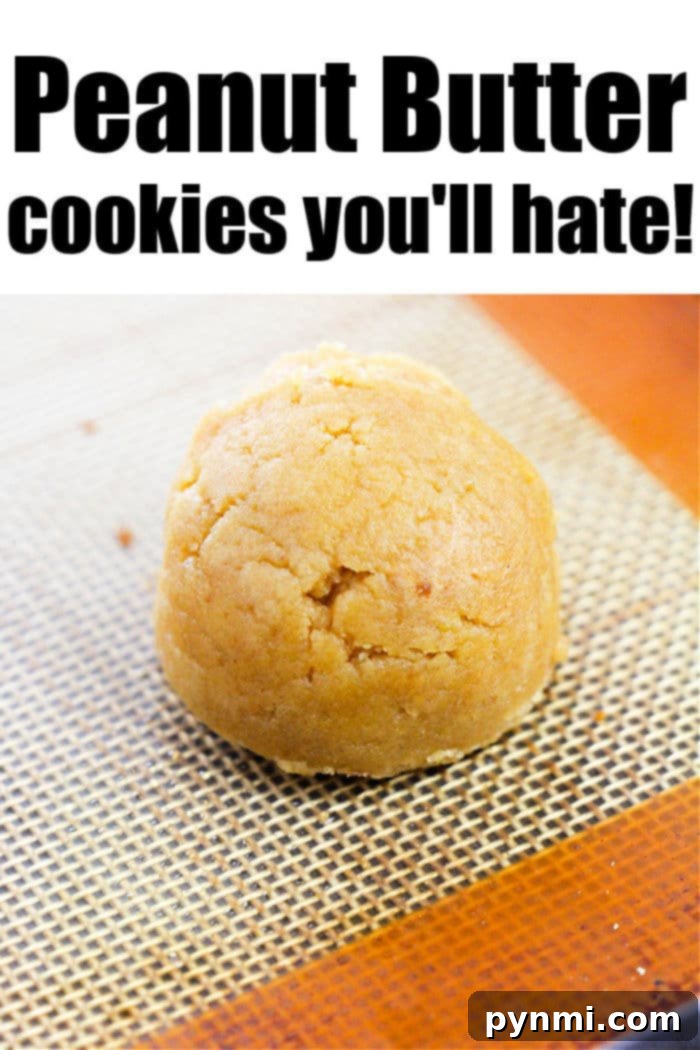 Effortless 4-Ingredient Peanut Butter Delights 3 A single peanut butter cookie sits on a baking mat. The text above the cookie reads