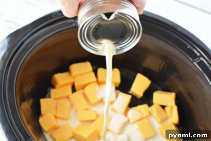 Ultimate Slow Cooker Mac and Cheese 3 Perfectly cooked slow cooker macaroni and cheese with a rich, smooth sauce.