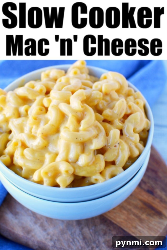 Ultimate Slow Cooker Mac and Cheese 7 A generous serving of crockpot macaroni and cheese, ready for family dinner.