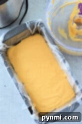 Wax paper-lined loaf pan, ready for the cheese sauce mixture.