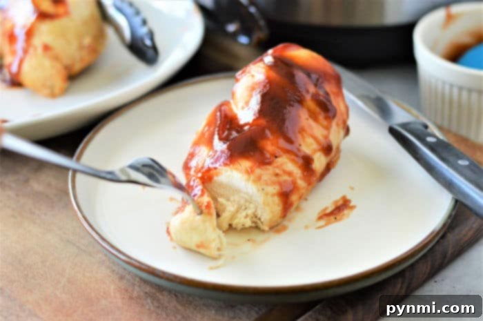 Instant Pot chicken breast, sliced and ready to serve, showing its incredible juiciness.