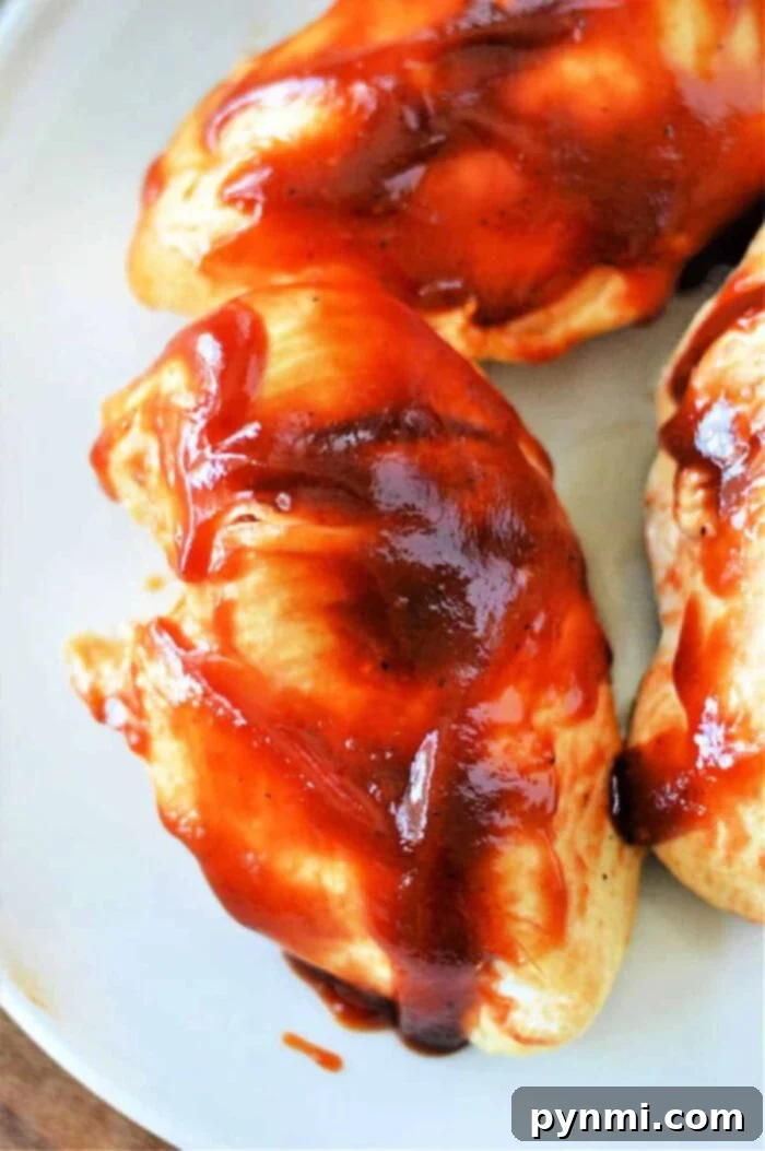 Frozen Chicken Breast in Pressure Cooker with Sauce, shown prepared and ready to be served.