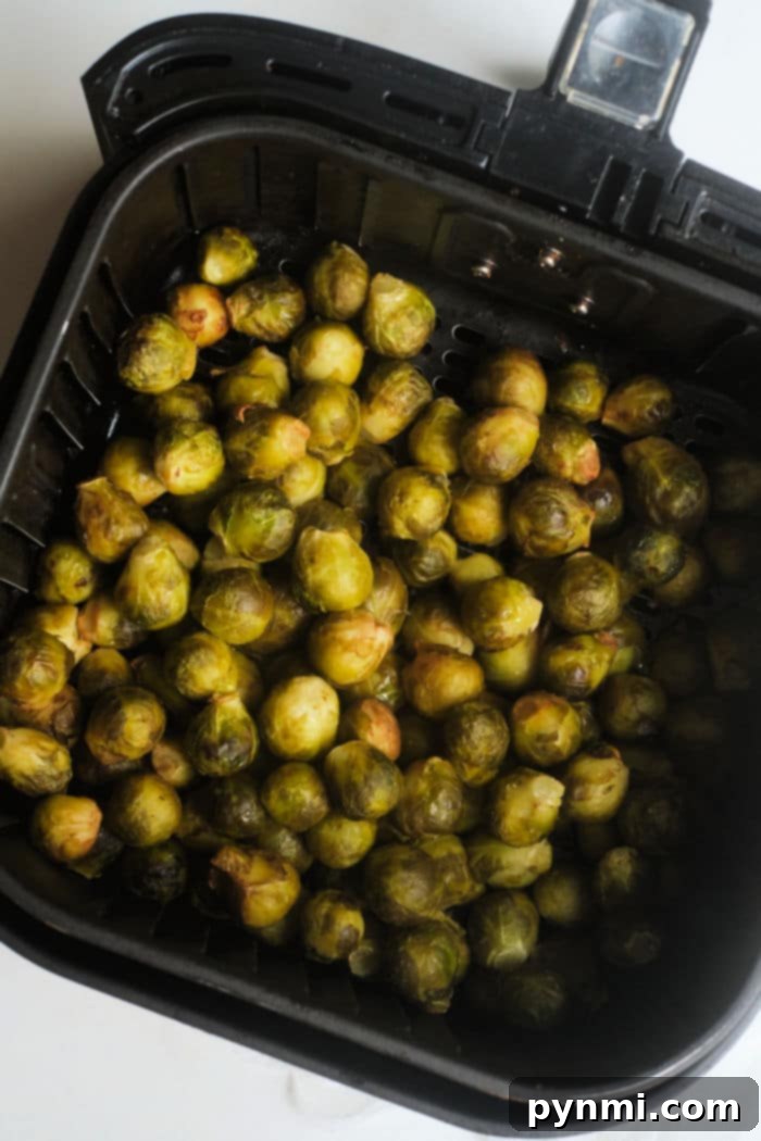 Crispy Air Fryer Frozen Brussels Sprouts 4 Air fryer Brussels sprouts coated in balsamic glaze, a delicious healthy side.
