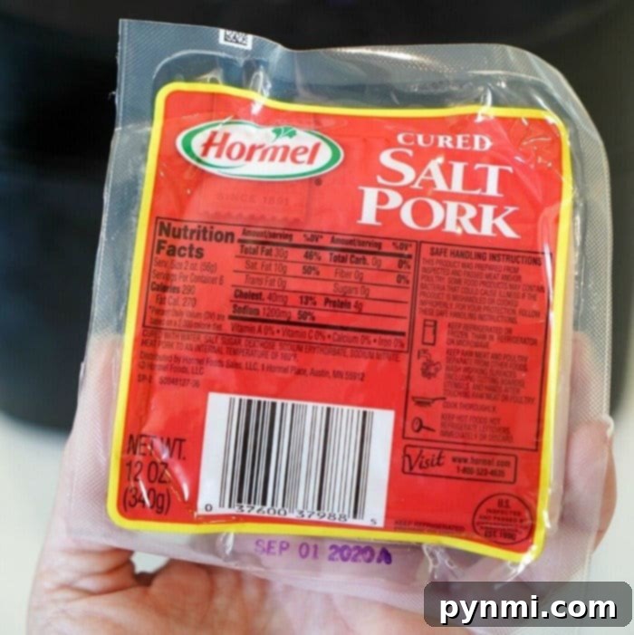 Crispy Oven-Roasted Pork Belly Perfection 3 A block of salt pork, vacuum-sealed, ready for slicing and cooking into delicious, crispy strips.