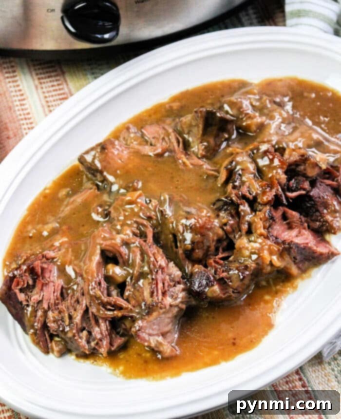 Crockpot roast beef and gravy with onion soup mix, ready to serve