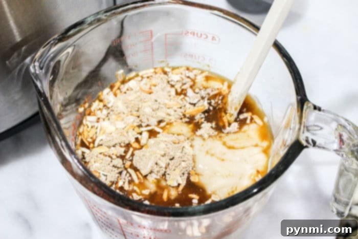 Rich, savory roast beef gravy simmering in a slow cooker