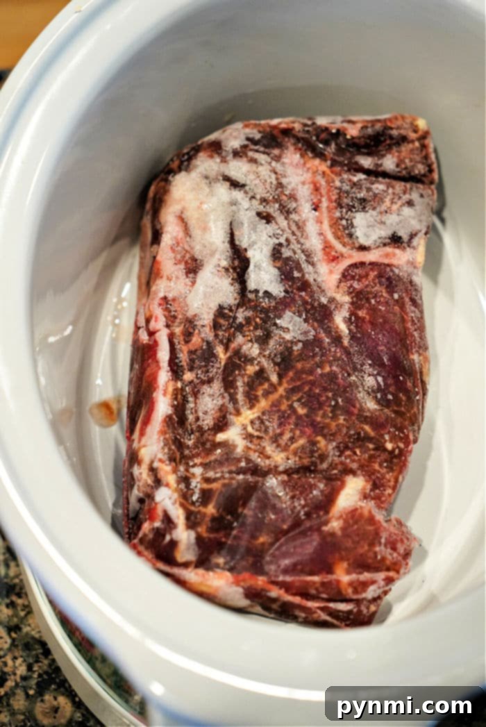 Frozen chuck roast ready for the crockpot