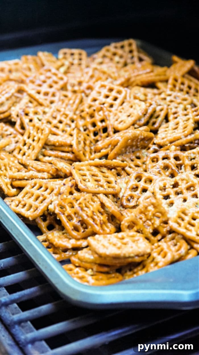 A close-up of a bowl filled with Dot's Honey Mustard Pretzels.