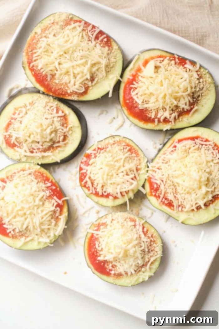 Crispy Air Fried Eggplant Parmesan No Breading 6 Air Fryer Eggplant Parmesan recipe, showing golden-brown slices in the basket