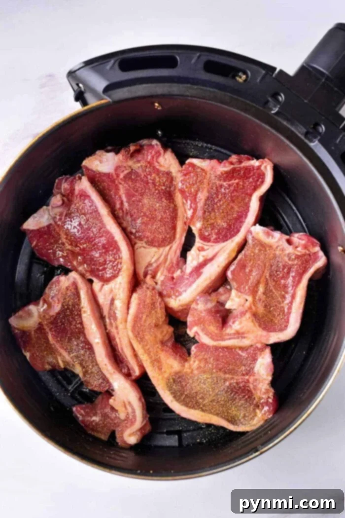 Air Fryer Lamb Chops: Your New Favorite Dinner 5 Ninja Foodi lamb chops, perfectly cooked and ready to serve, presented on a plate