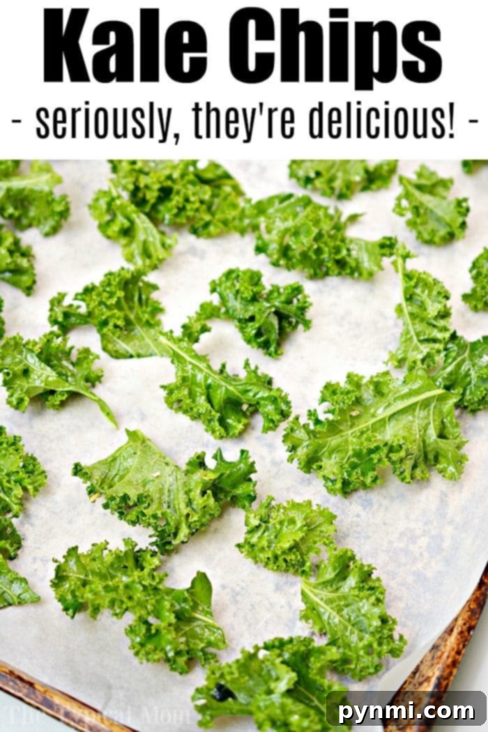 A close-up of perfectly baked kale chips, showing their vibrant green color and crunchy texture, ready for a healthy snack.