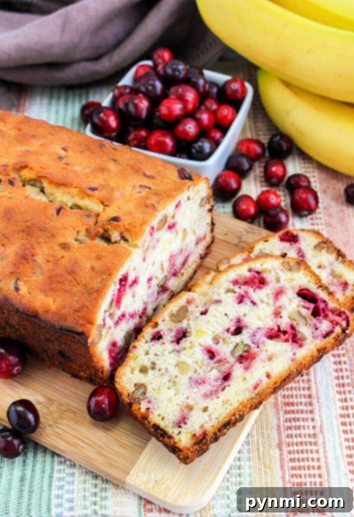 Cranberry Banana Bread recipe, a perfect blend of sweet banana and tart cranberries baked into a golden loaf.
