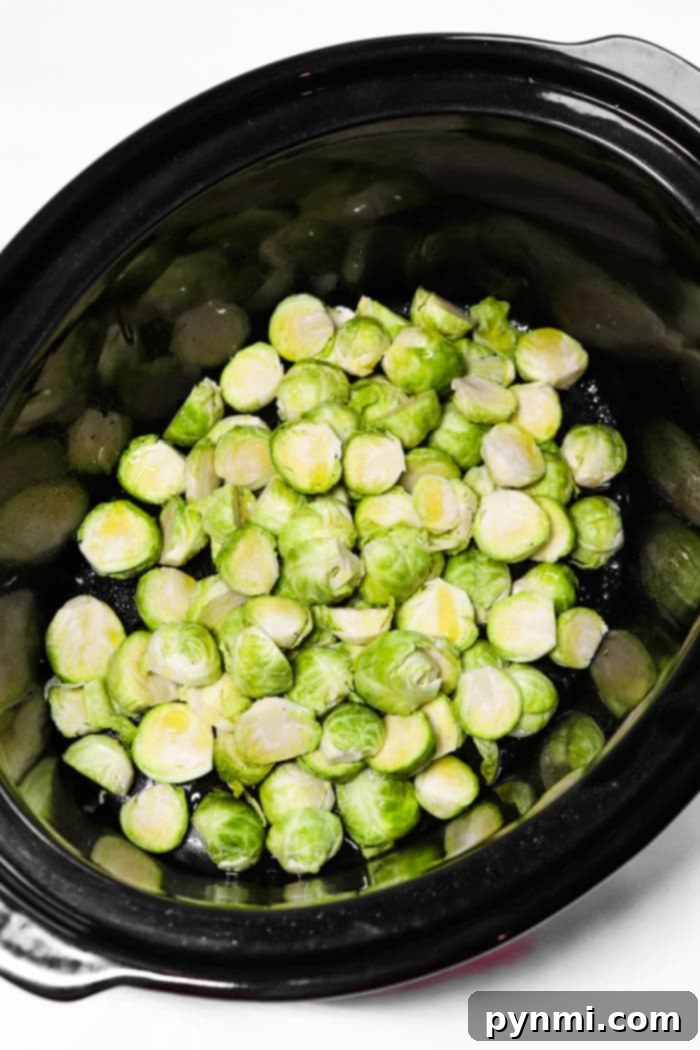 Frozen brussel sprouts, showing how pre-cut ones can be used in a slow cooker.